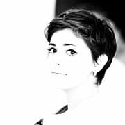 woman in black shirt grayscale photo